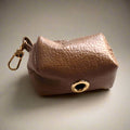 beige leather poopbag holder