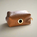 beige leather poopbag holder