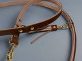 Unleash unparalleled luxury with the DELUXE Adjustable Leash by Cavlicious. Made until with the finest buttersoft leather, each leash is a masterpiece in quality and style. The leash is fully adjustable to offer ultimate comfort and control while presenting a look that's effortlessly chic. True Pet owners demand only the best for their cherished companions.

This adjustable leash is made from buttery soft leather and has multiple D-rings. The leash can be worn handsfree around the hips or shoulder.