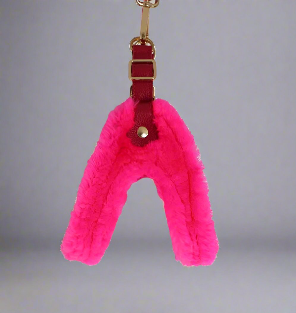 dog step in harness made from genuine lambs wool in hot pink.