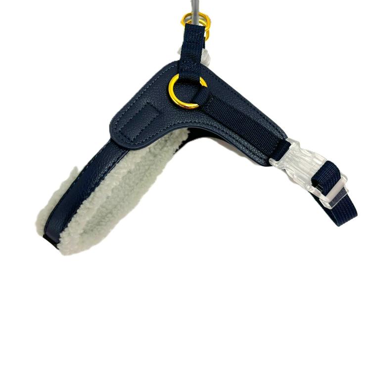 a blue step in dog harness with sherpa