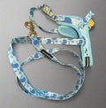 The Wag&Wonder step in harness offers both style and comfort for your furry friend. With a choice between colorful sealife or dinosaur prints, this harness features adjustable straps and padded lining for a snug and comfortable fit. Made with durable metal hardware, it is also machine washable for easy maintenance. This harness comes with a matching leash from 1.50m long, with neoprene padded handle. 